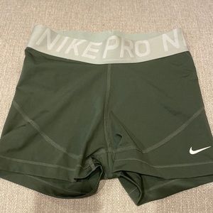 green nike pros